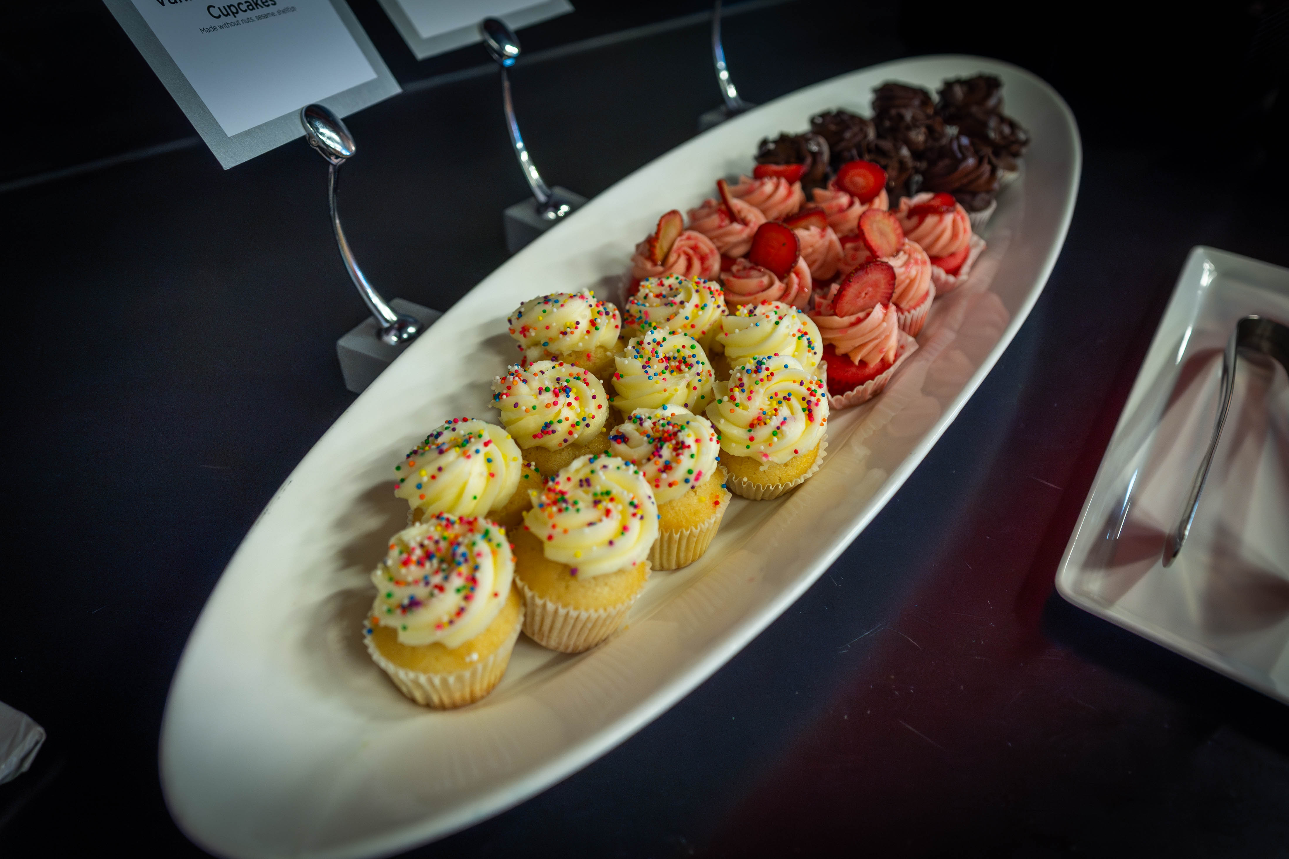 cupcakes and fruit on platter