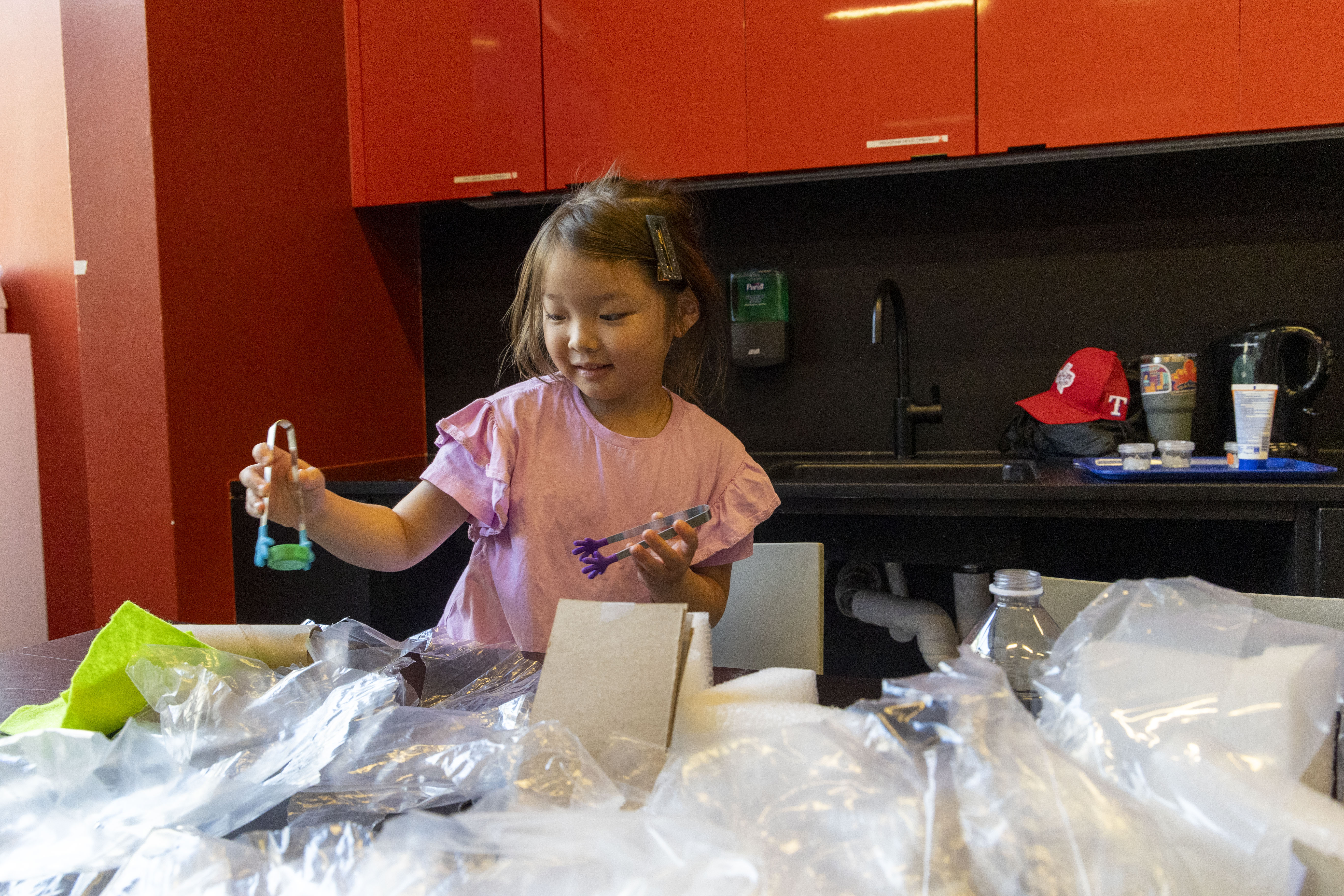 kid performing Earth Rocks lab