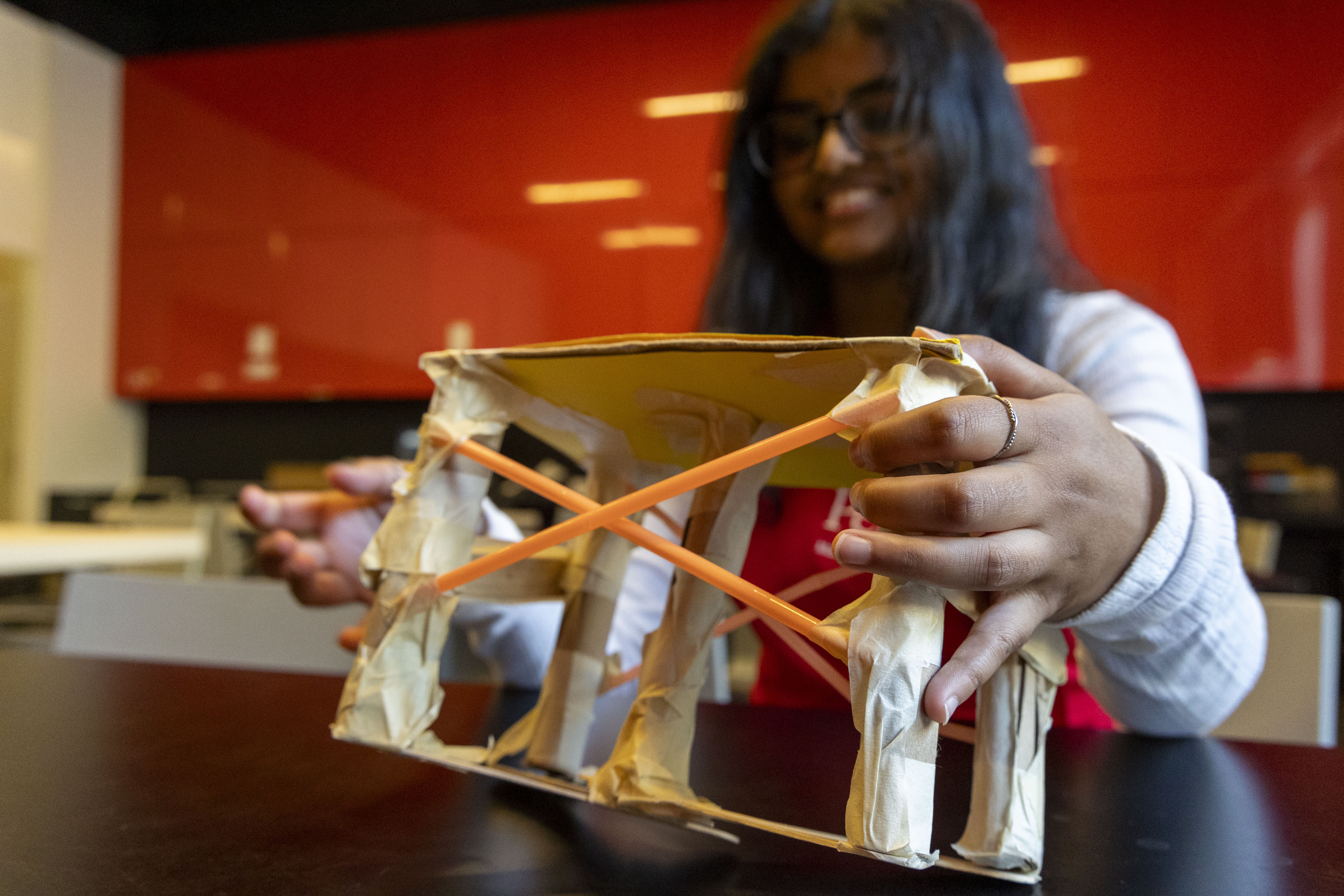 kid holding bridge design